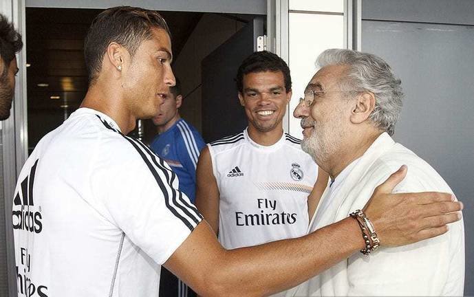 MADRID, SPAIN - JULY 20:  Placido Domingo (R) meets Cristiano Ronaldo (L) and Pepe (C) during his visit to the Real Madrid Football Club on July 20, 2013 in Madrid, Spain.  (Photo by Antonio Villalba/Real Madrid via Getty Images)