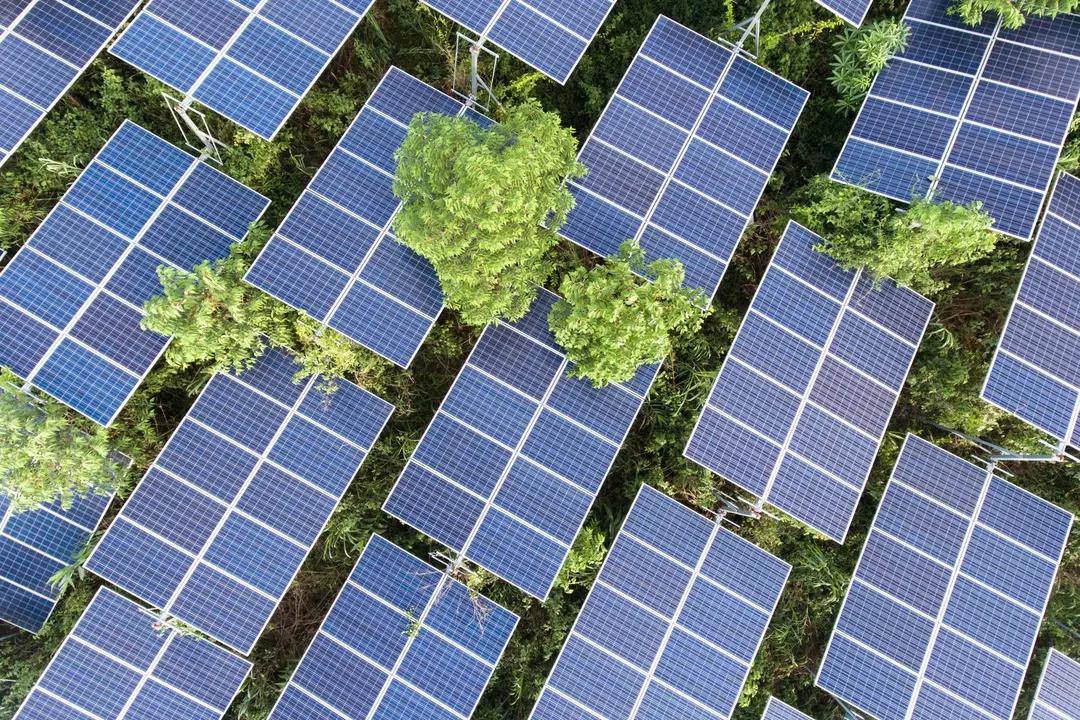 Beautiful sunset over Solar Farm with sunset on the background