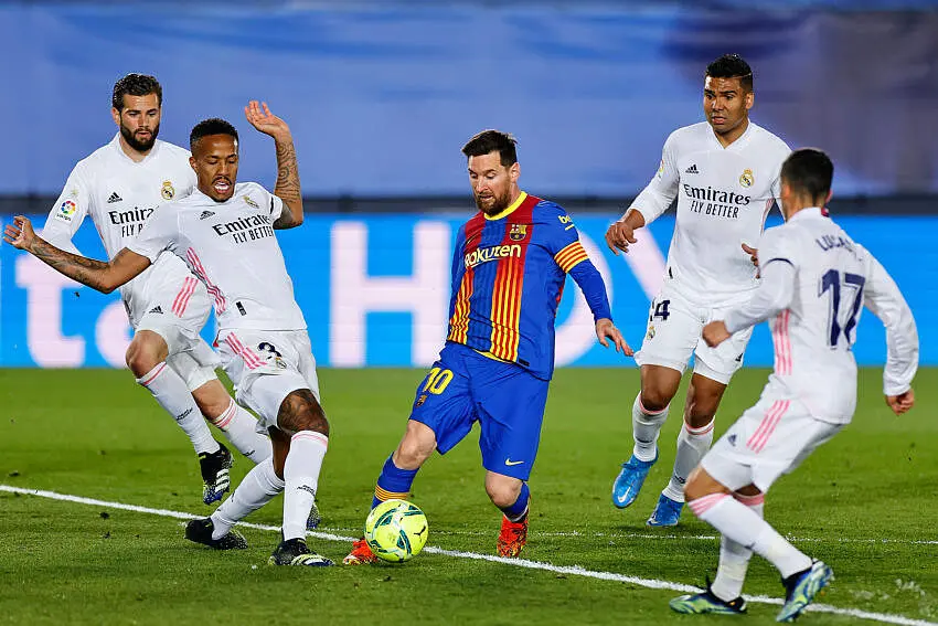Lionel Messi of FC Barcelona and players of Real Madrid during the La Liga match between Real Madrid and FC Barcelona played at Alfredo Di Stefano Stadium on April 10, 2021 in Madrid, Spain. (Photo by Ruben Albarran / Pressinphoto / Icon Sport)  By Icon Sport   - Photo by Icon Sport