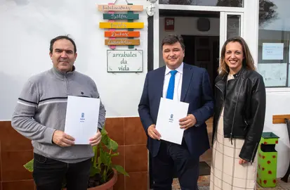 Firma del convenio y visita a Arrabales