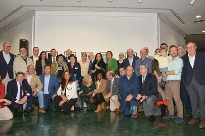 Organizadores y personas protagonistas de las fotografías