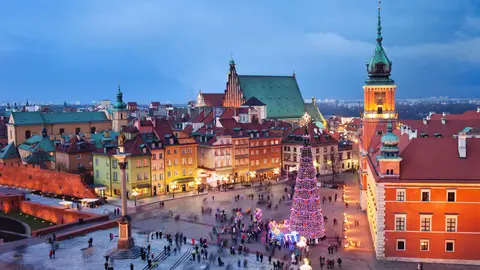 Beautiful Old Town of Warsaw in Poland illuminated at evening, during Christmas time.