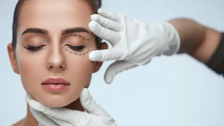 Facial Treatment. Portrait Of Beautiful Sexy Woman With Closed Eyes And Black Surgical Lines On Skin. Closeup Of Hands Touching Young Female Face. Plastic Surgery Concept. High Resolution