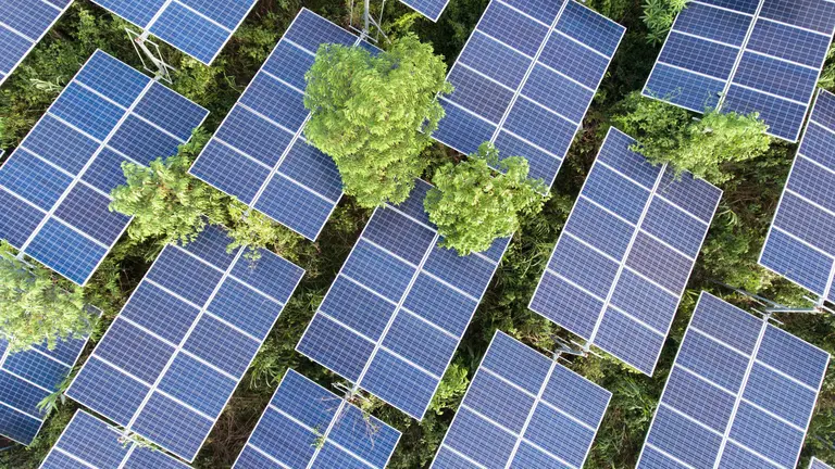 Beautiful sunset over Solar Farm with sunset on the background