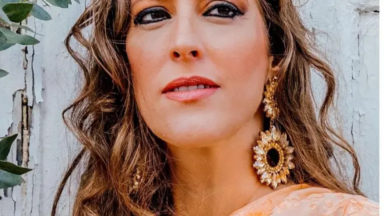 Cartel de la actuación de Argentina / Fotografía: Ayuntamiento de Santa Olalla del Cala.