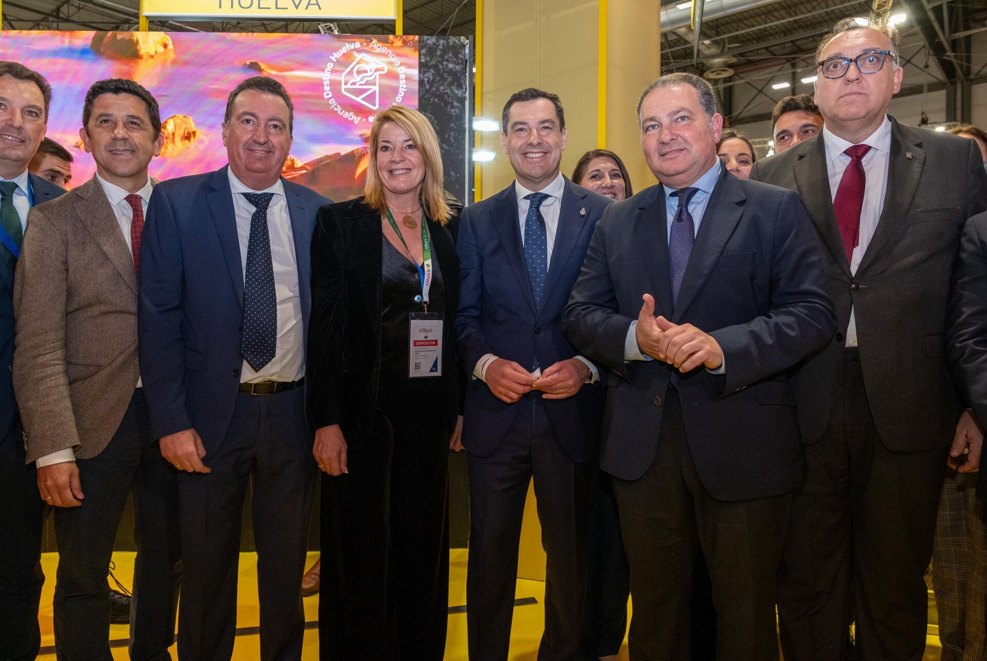 Visita de Juanma Moreno al stand de Huelva, junto a David Toscano y Pilar Miranda